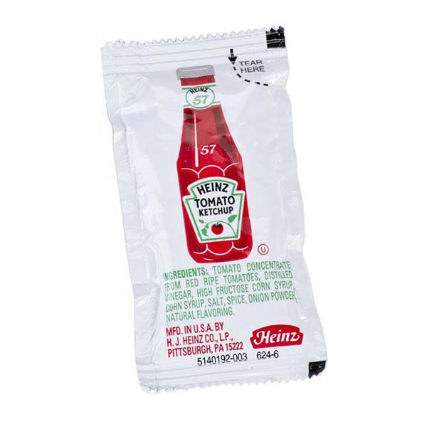 A packet of Food Condiments for Coffee Man Beverage Services on a white background.